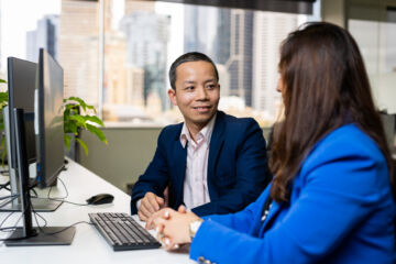 eWorks Maximise your investment one male and one female at a computer