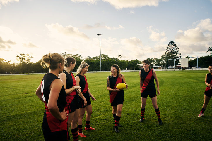 eWorks AFL Sports Ready Case Study group of female footballers