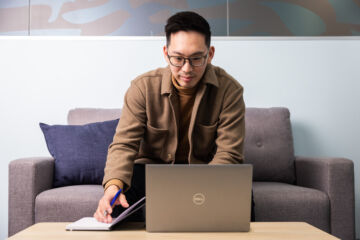 Student Using a Content Management System on a Laptop