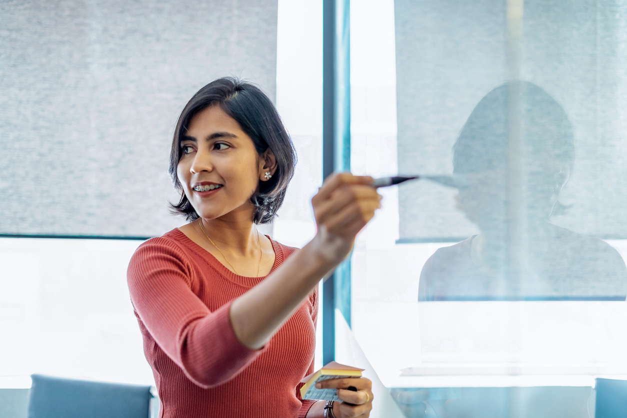 Young female instructional designer instructing